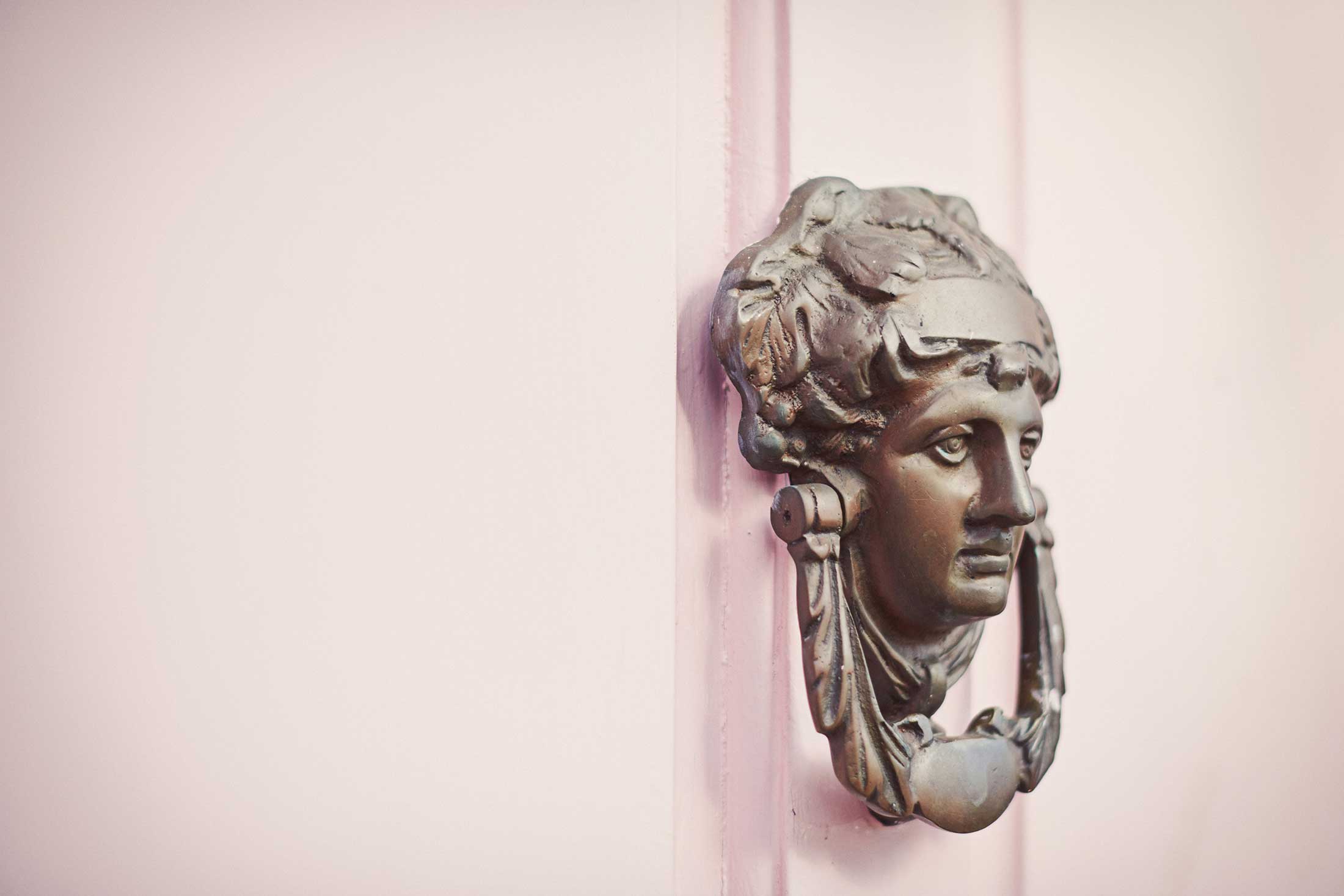Brass door knocker on pink door - Chelmsford - Beresfords Estate agents - Essex