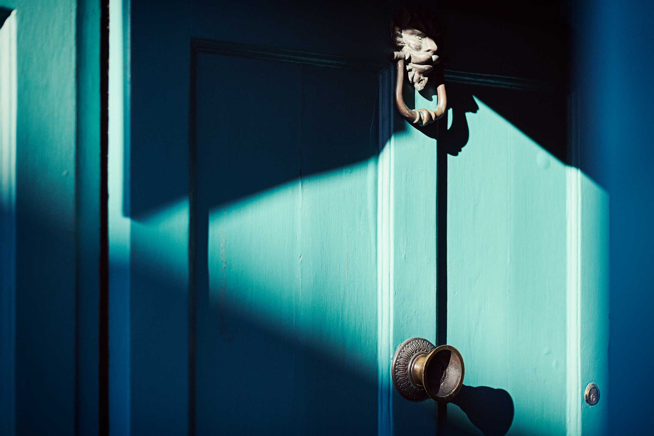 Close up of shadows on blue door - Colchester - Beresfords Estate agents - Essex