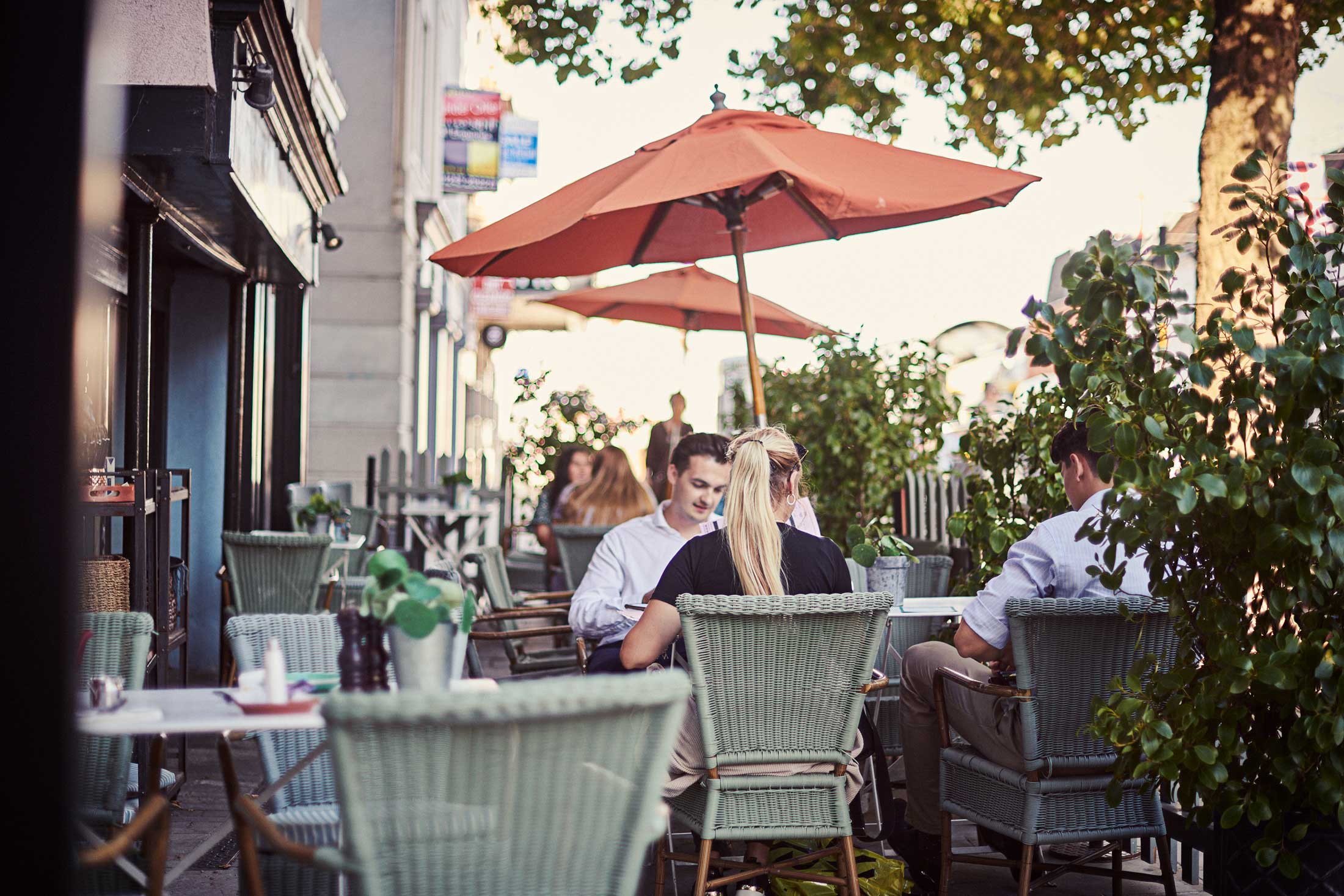 Friends sat outside restaurant - Colchester - Beresfords Estate agents - Essex