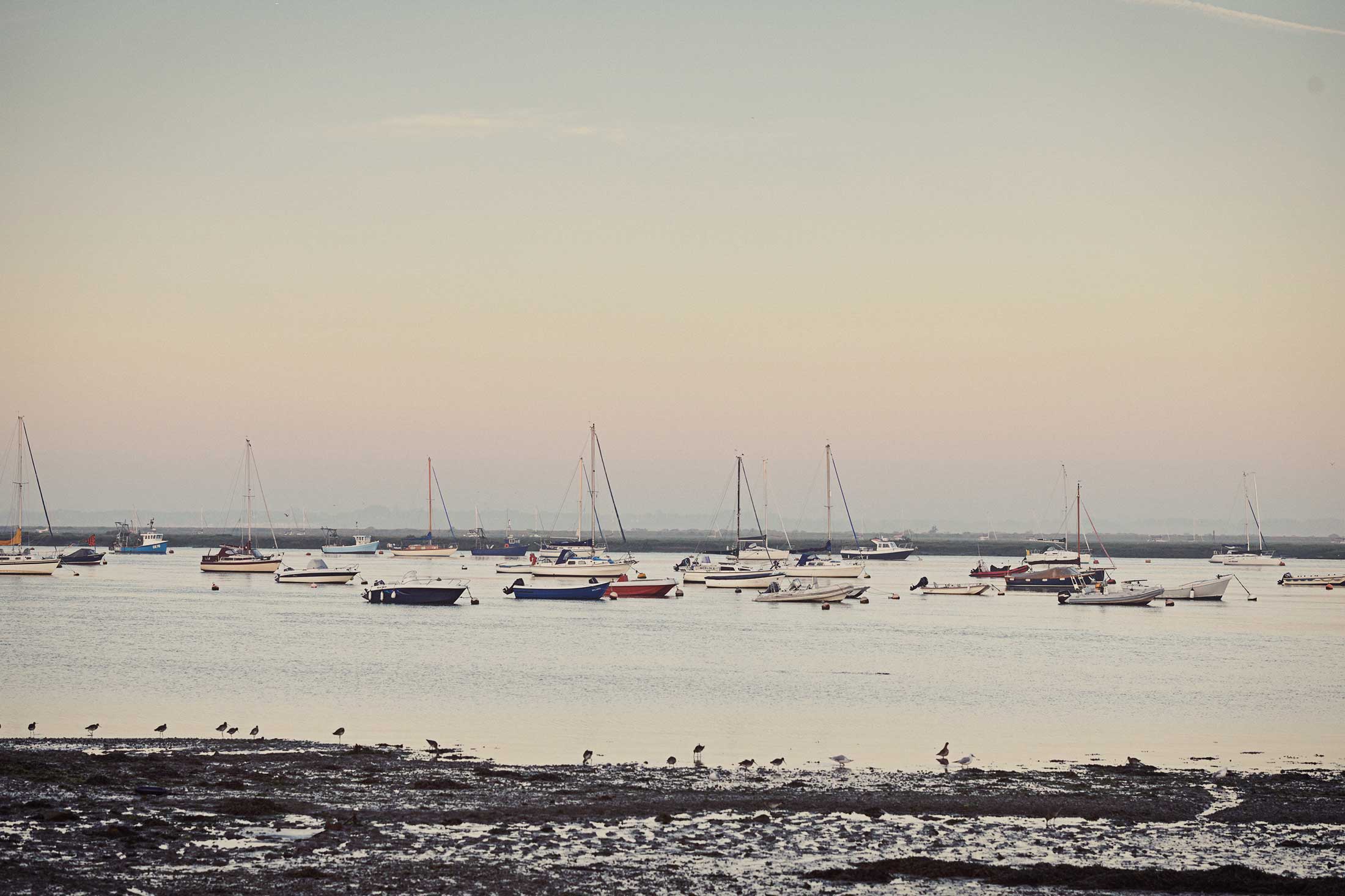 Boats in harbour at sunset - Mersea Island - Beresfords Estate agents - Essex