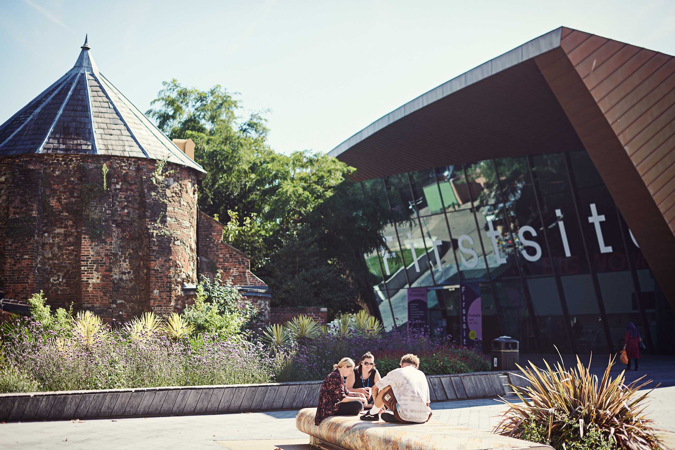 Friends sat outside of Firstsite art gallery - Colchester - Beresfords Estate agents - Essex