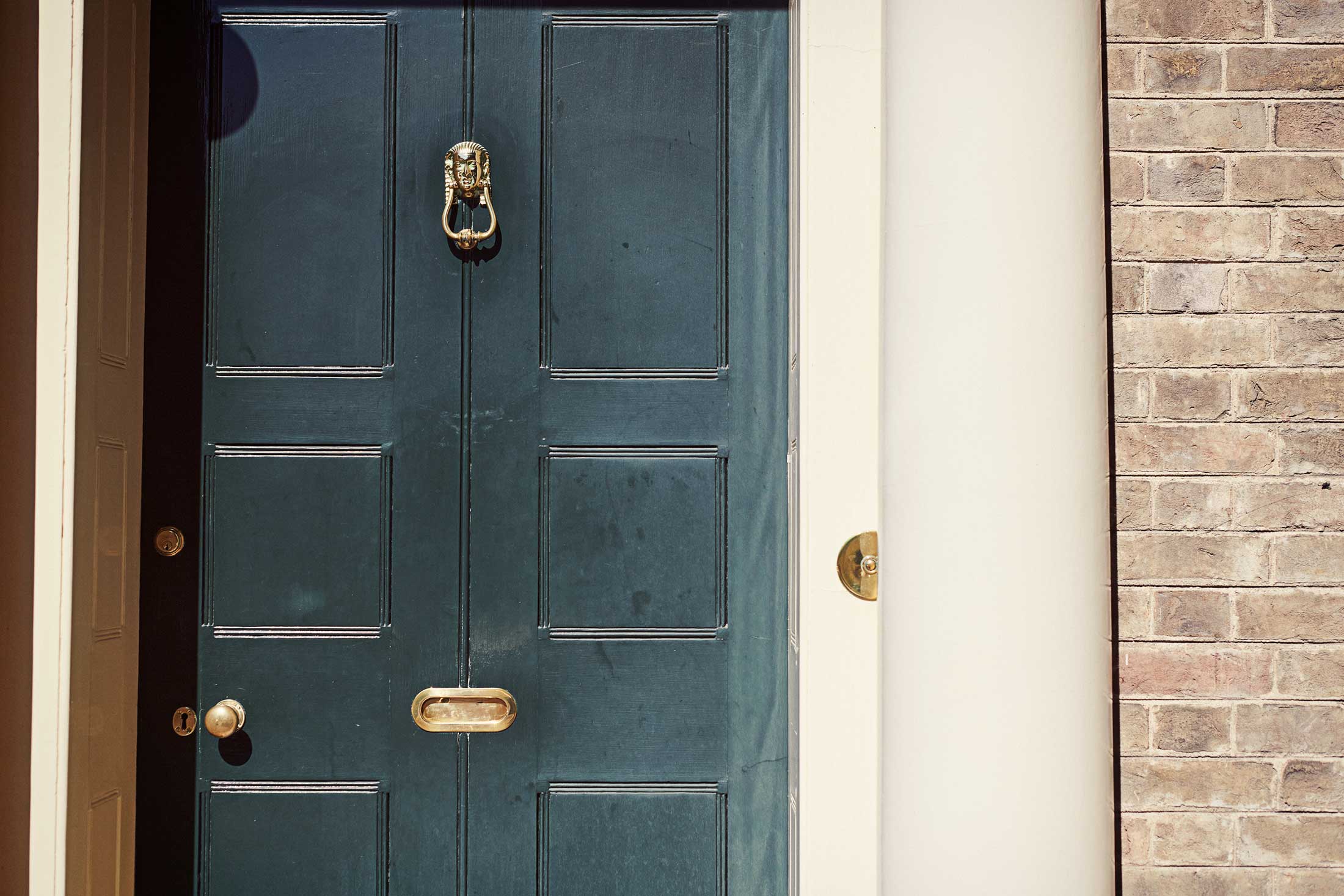 Green door with gold details - Dedham - Beresfords Estate agents - Essex