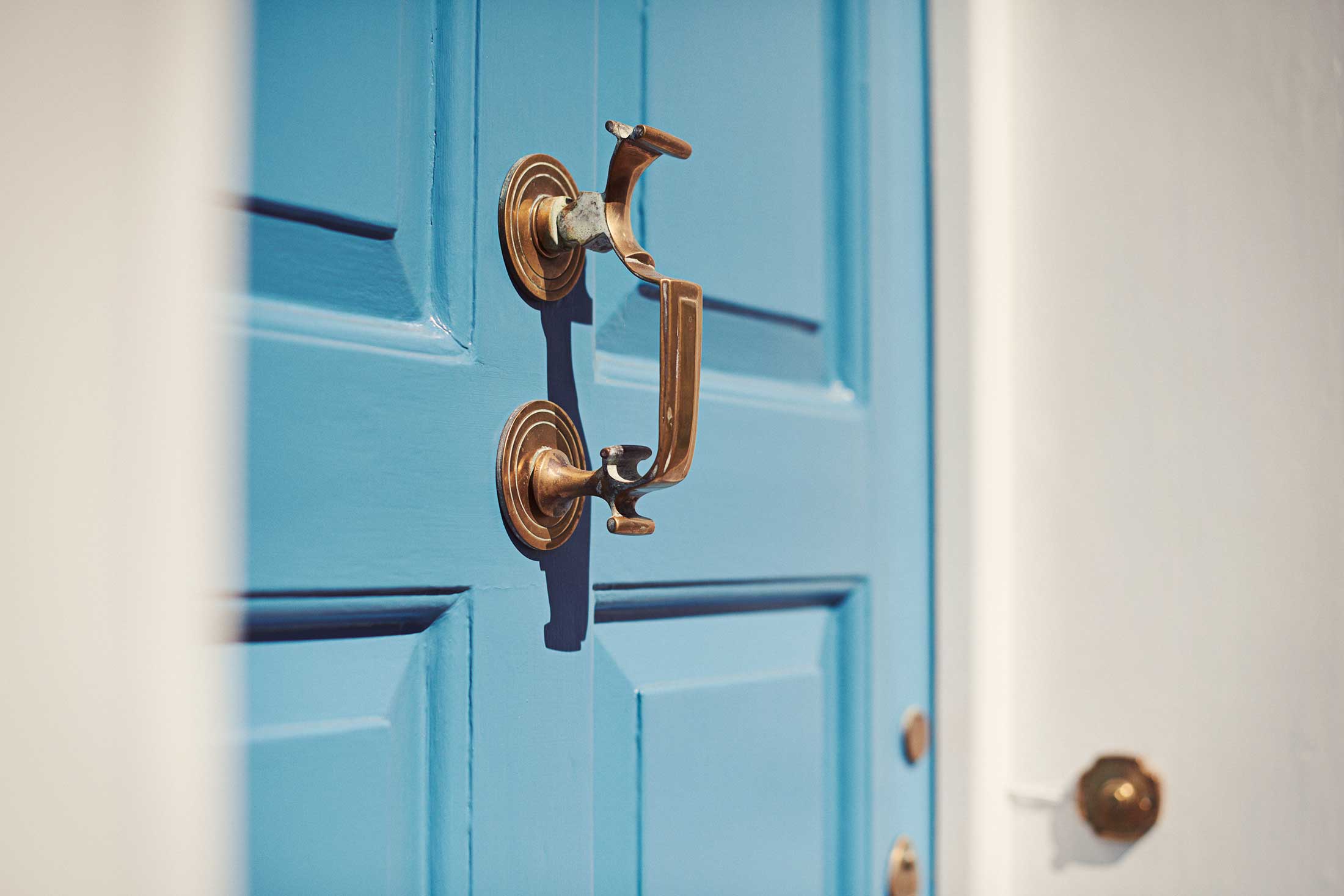 Close up of handle on blue door - Dedham - Beresfords Estate agents - Essex